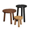 Tiny, medium, and large wooden stools in different finishes